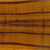 KOA - Koa wood is unique to Hawaii and is not found anywhere else in the world. The color can range from reds to chocolate browns.  Koa has a fine grain with a medium coarse texture, but it is the figuring that sets Koa into a class of it's own.